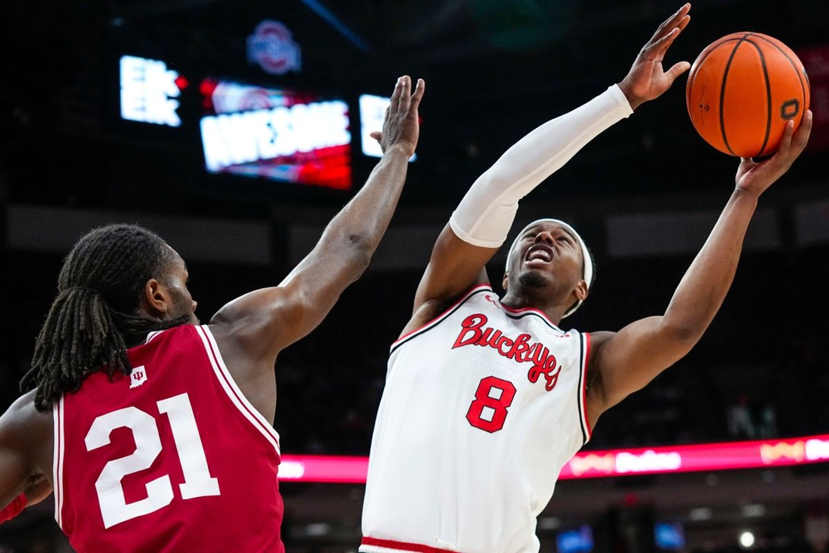 Ohio State Buckeyes guard Micah Parrish (8) shoots the ball against Indiana Hoosiers forward Mackenzie Mgbako (21) in the first half at Value City Arena on Friday, Jan. 17, 2025 in Columbus, Ohio.