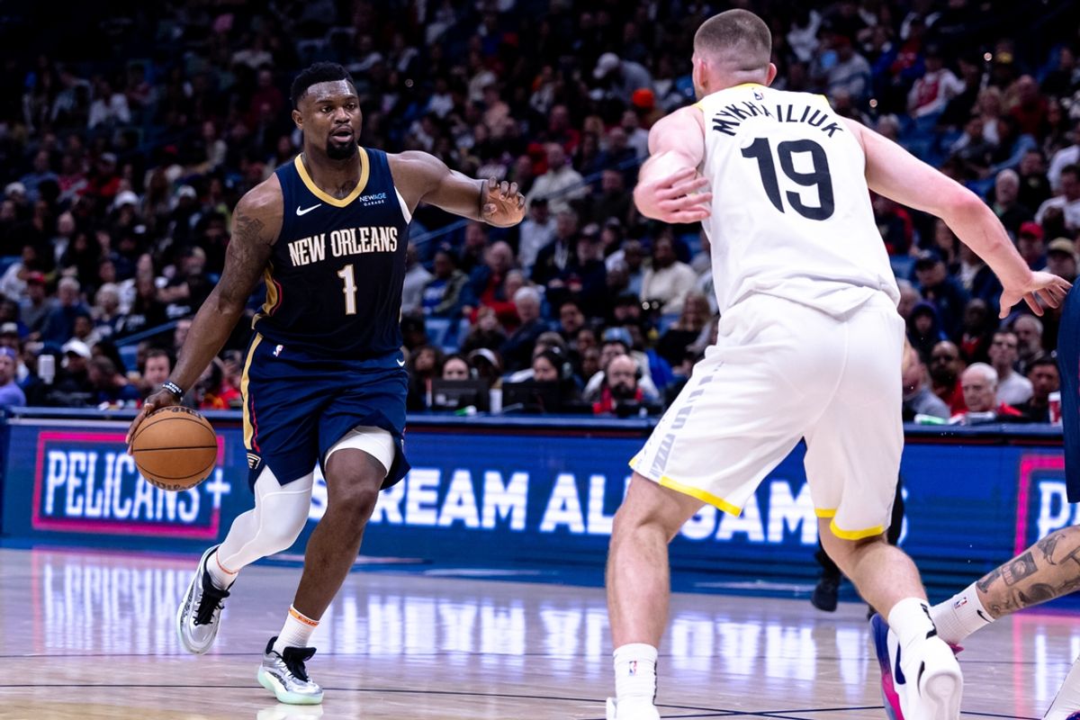 Jan 17, 2025; New Orleans, Louisiana, USA; New Orleans Pelicans forward Zion Williamson (1) drives to the basket against Utah Jazz guard Svi Mykhailiuk (19) during the first half at Smoothie King Center. Mandatory Credit: Stephen Lew-Imagn Images