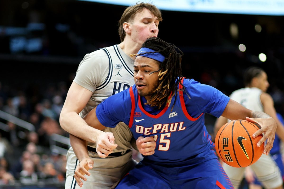 Jan 17, 2025; Washington, District of Columbia, USA; DePaul Blue Demons forward NJ Benson (35) backs down Georgetown Hoyas forward Drew Fielder (20) during the second half at Capital One Arena. Mandatory Credit: Daniel Kucin Jr.-Imagn Images