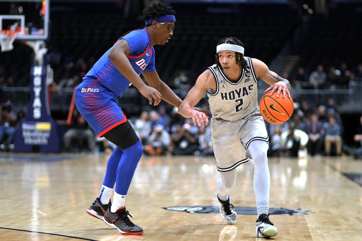 Jan 17, 2025; Washington, District of Columbia, USA; Georgetown Hoyas guard Malik Mack (2) drives past DePaul Blue Demons guard Layden Blocker (2) during the first half at Capital One Arena. Mandatory Credit: Daniel Kucin Jr.-Imagn Images