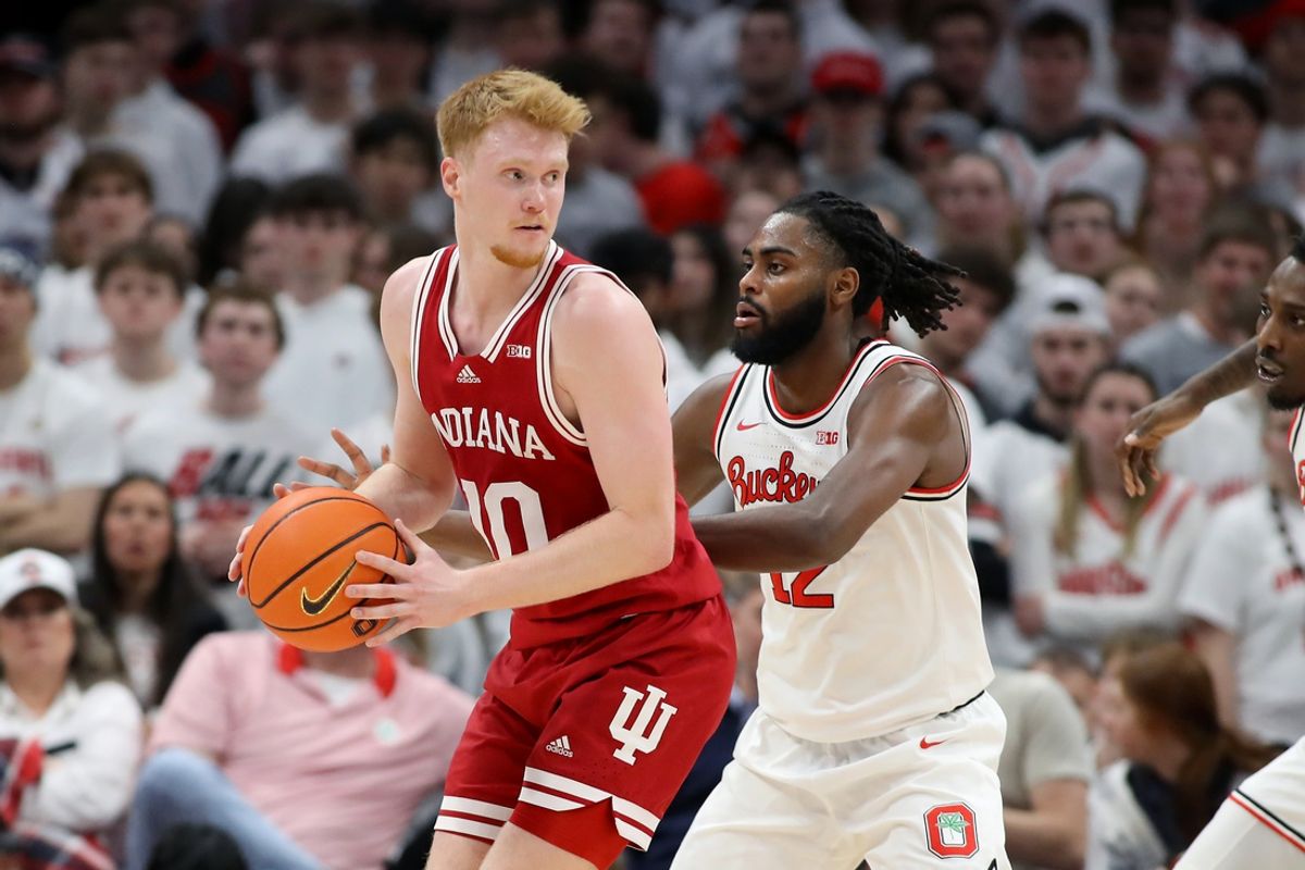 Jan 17, 2025; Columbus, Ohio, USA; Indiana Hoosiers forward Luke Goode (10) looks to pass as Ohio State Buckeyes guard Evan Mahaffey (12) defends during the second half at Value City Arena. Mandatory Credit: Joseph Maiorana-Imagn Images