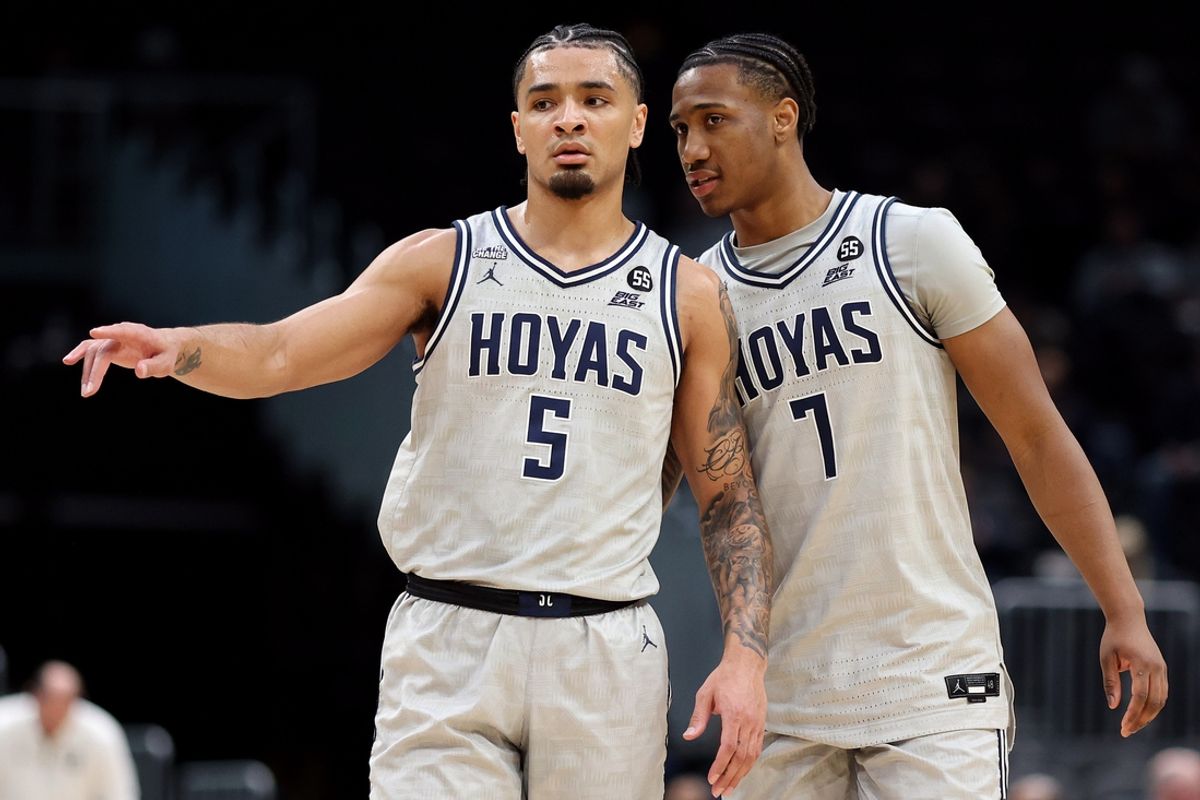 Jan 17, 2025; Washington, District of Columbia, USA; Georgetown Hoyas guard Micah Peavy (5) speaks with forward Drew McKenna (7) during the first half against the DePaul Blue Demons at Capital One Arena. Mandatory Credit: Daniel Kucin Jr.-Imagn Images
