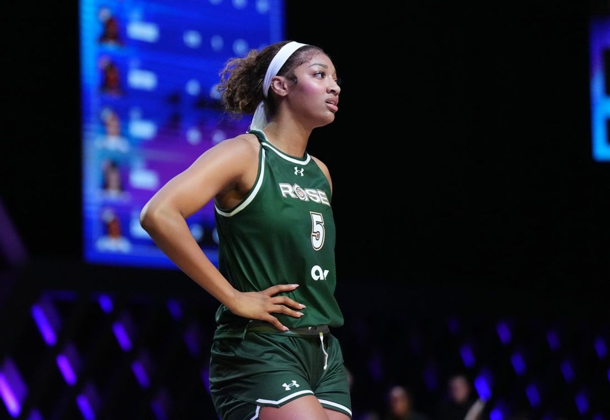 Jan 17, 2025; Miami, FL, USA; Angel Reese (5) of the Rose takes a moment against the Vinyl during a timeout in the first half of the Unrivaled women’s professional 3v3 basketball league at Wayfair Arena. Mandatory Credit: Jim Rassol-Imagn Images