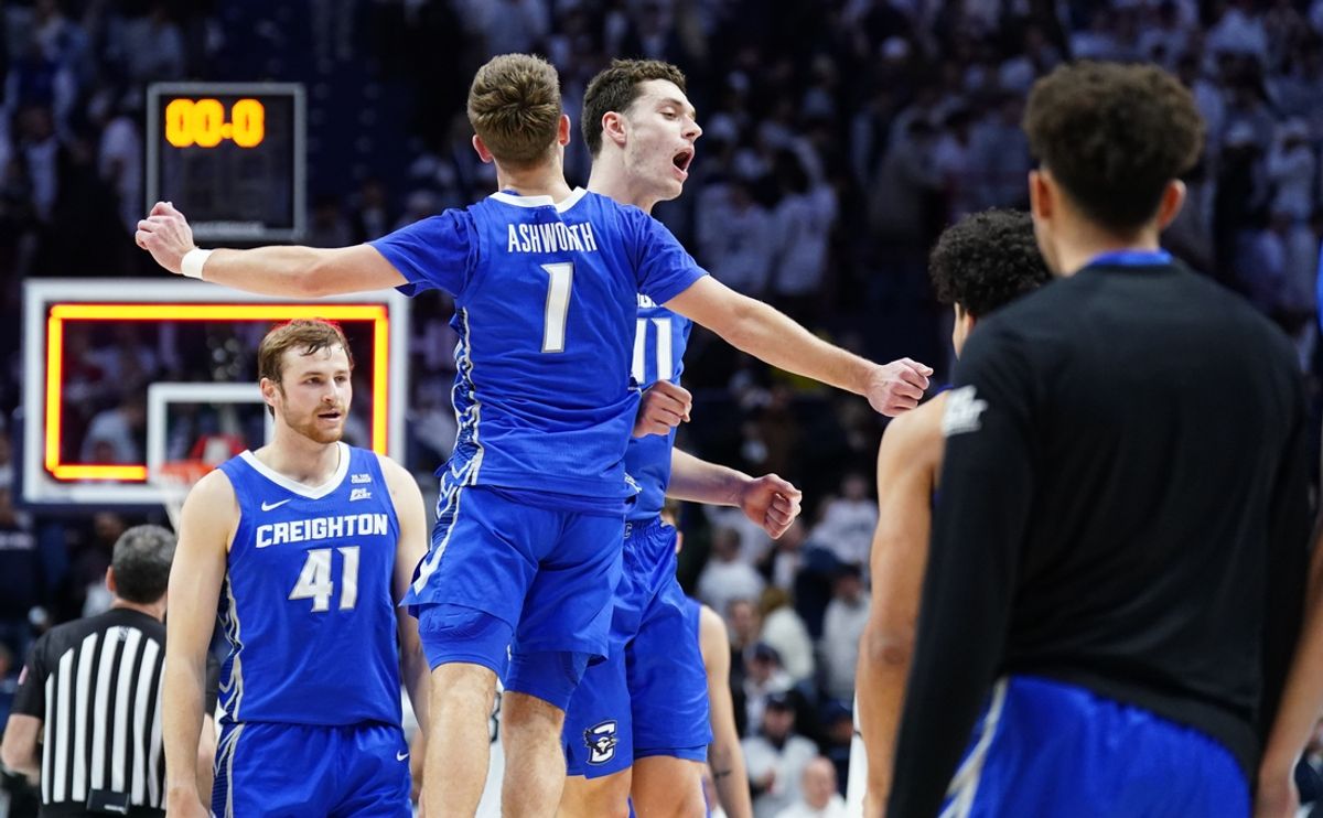 Jan 18, 2025; Storrs, Connecticut, USA; Creighton Bluejays center Ryan Kalkbrenner (11) and guard Steven Ashworth (1) react after defeating the UConn Huskies at Harry A. Gampel Pavilion. Mandatory Credit: David Butler II-Imagn Images