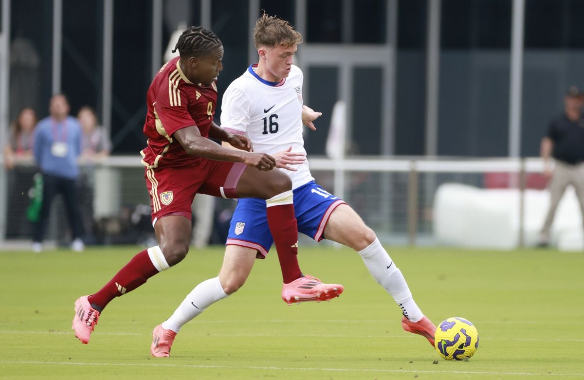 Jan 18, 2025; Fort Lauderdale, Florida, USA;  United States midfielder Jack McGlynn (16) and Venezuela forward Jan Hurtado (9) fight for the ball during the first half at Chase Stadium. Mandatory Credit: Rhona Wise-Imagn Images