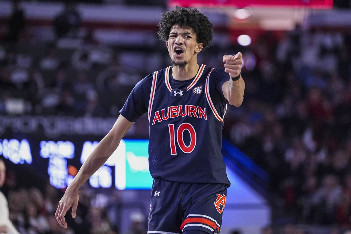 Jan 18, 2025; Athens, Georgia, USA; Auburn Tigers guard Chad Baker-Mazara (10) reacts after scoring a three point basket against the  Georgia Bulldogs at Stegeman Coliseum. Mandatory Credit: Dale Zanine-Imagn Images