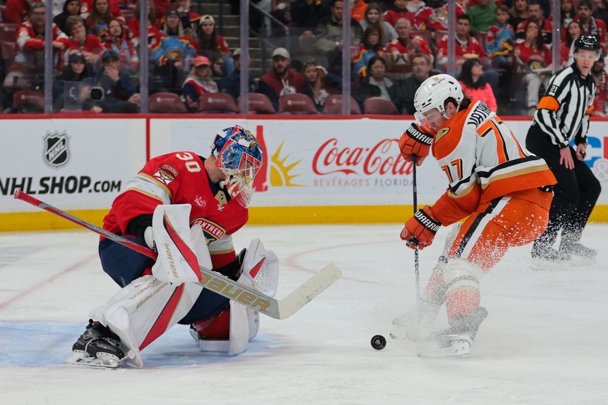 Jan 18, 2025; Sunrise, Florida, USA; Florida Panthers goaltender Spencer Knight (30) makes a save against Anaheim Ducks right wing Frank Vatrano (77) during the second period at Amerant Bank Arena. Mandatory Credit: Sam Navarro-Imagn Images