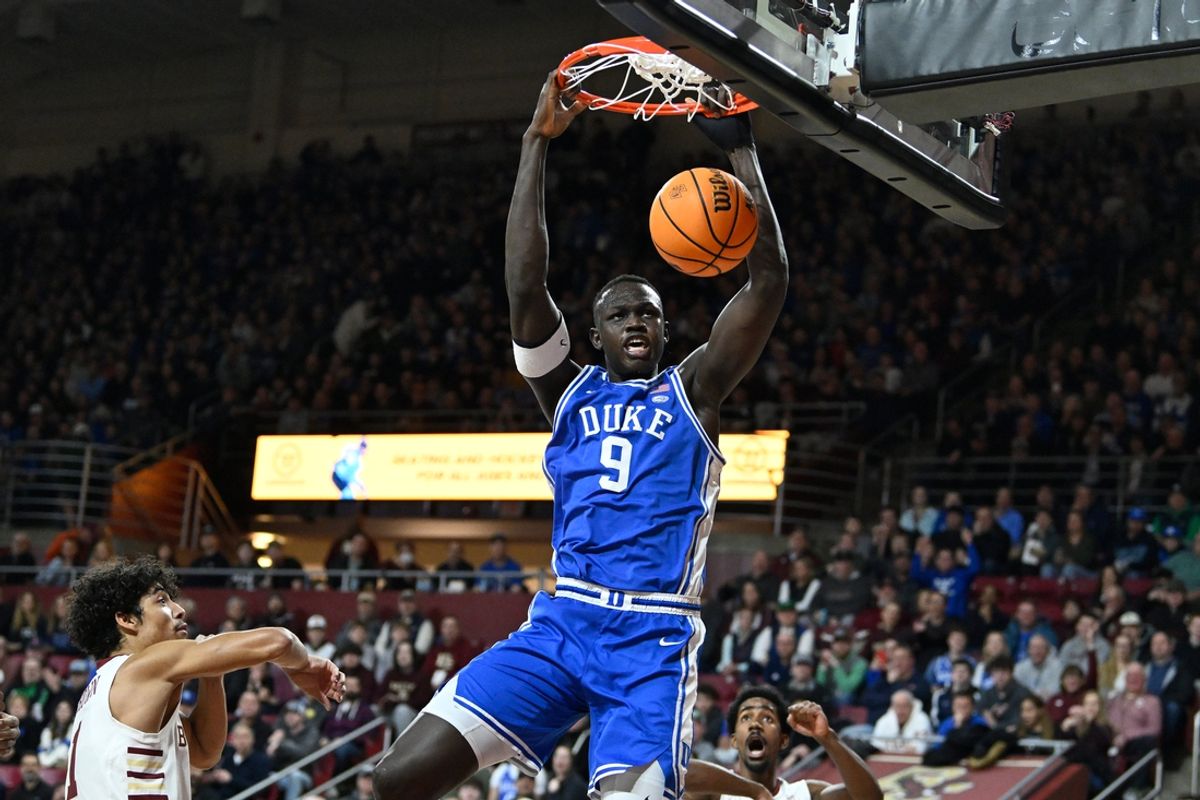 Jan 18, 2025; Chestnut Hill, Massachusetts, USA; Duke Blue Devils center Khaman Maluach (9) dunks the ball against the Boston College Eagles during the first half at Conte Forum. Mandatory Credit: Eric Canha-Imagn Images