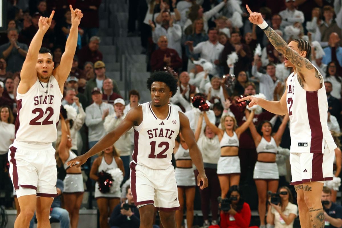 Jan 18, 2025; Starkville, Mississippi, USA; Mississippi State Bulldogs forward RJ Melendez (22), guard Josh Hubbard (12) and guard Riley Kugel (2) react during over-time against the Mississippi Rebels at Humphrey Coliseum. Mandatory Credit: Petre Thomas-Imagn Images