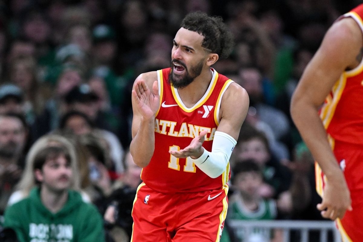`Jan 18, 2025; Boston, Massachusetts, USA; Atlanta Hawks guard Trae Young (11) reacts after scoring against the Boston Celtics during the fourth quarter at the TD Garden. Mandatory Credit: Brian Fluharty-Imagn Images