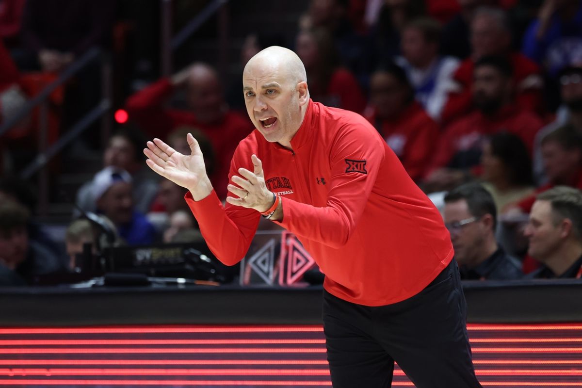 Jan 18, 2025; Salt Lake City, Utah, USA; Utah Utes head coach Craig Smith cheers the team against the Brigham Young Cougars during the first half at Jon M. Huntsman Center. Mandatory Credit: Rob Gray-Imagn Images