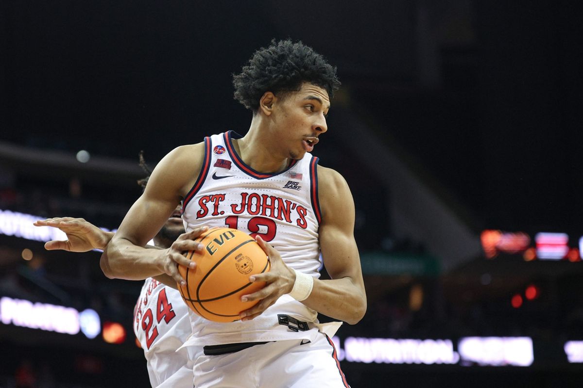 Jan 18, 2025; Newark, New Jersey, USA; St. John's Red Storm guard RJ Luis Jr. (12) rebounds during the second half against the Seton Hall Pirates at Prudential Center. Mandatory Credit: Vincent Carchietta-Imagn Images