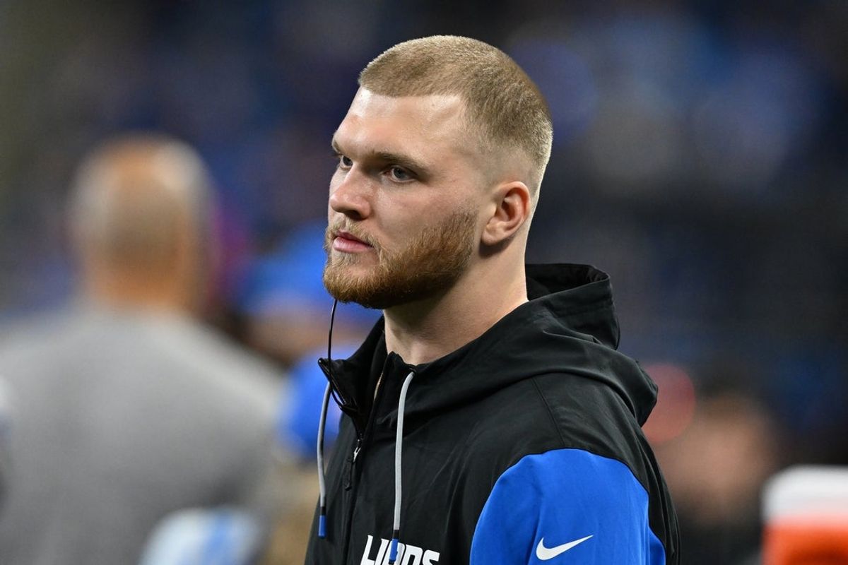 Jan 18, 2025; Detroit, Michigan, USA; Detroit Lions defensive lineman Aidan Hutchinson (97) looks on from the bench during the fourth quarter against the Washington Commanders in a 2025 NFC divisional round game at Ford Field. Mandatory Credit: Lon Horwedel-Imagn Images