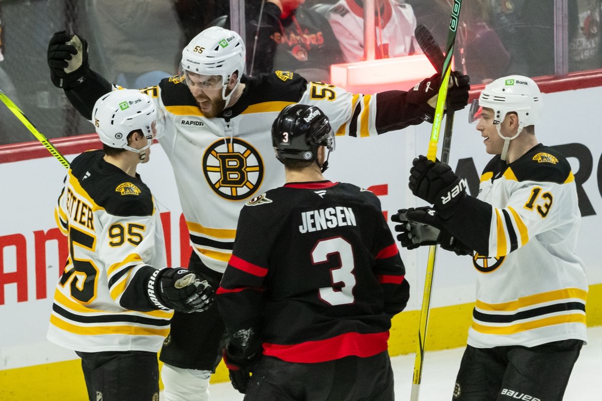 Jan 18, 2025; Ottawa, Ontario, CAN; Boston Bruins right wing Justin Brazeau (55) and center Charlie Coyle (13) celebrate a goal scored by center Vinni Lettieri (95) as Ottawa Senators defenseman Nick Jensen (3) looks on in the third period at the Canadian Tire Centre. Mandatory Credit: Marc DesRosiers-Imagn Images