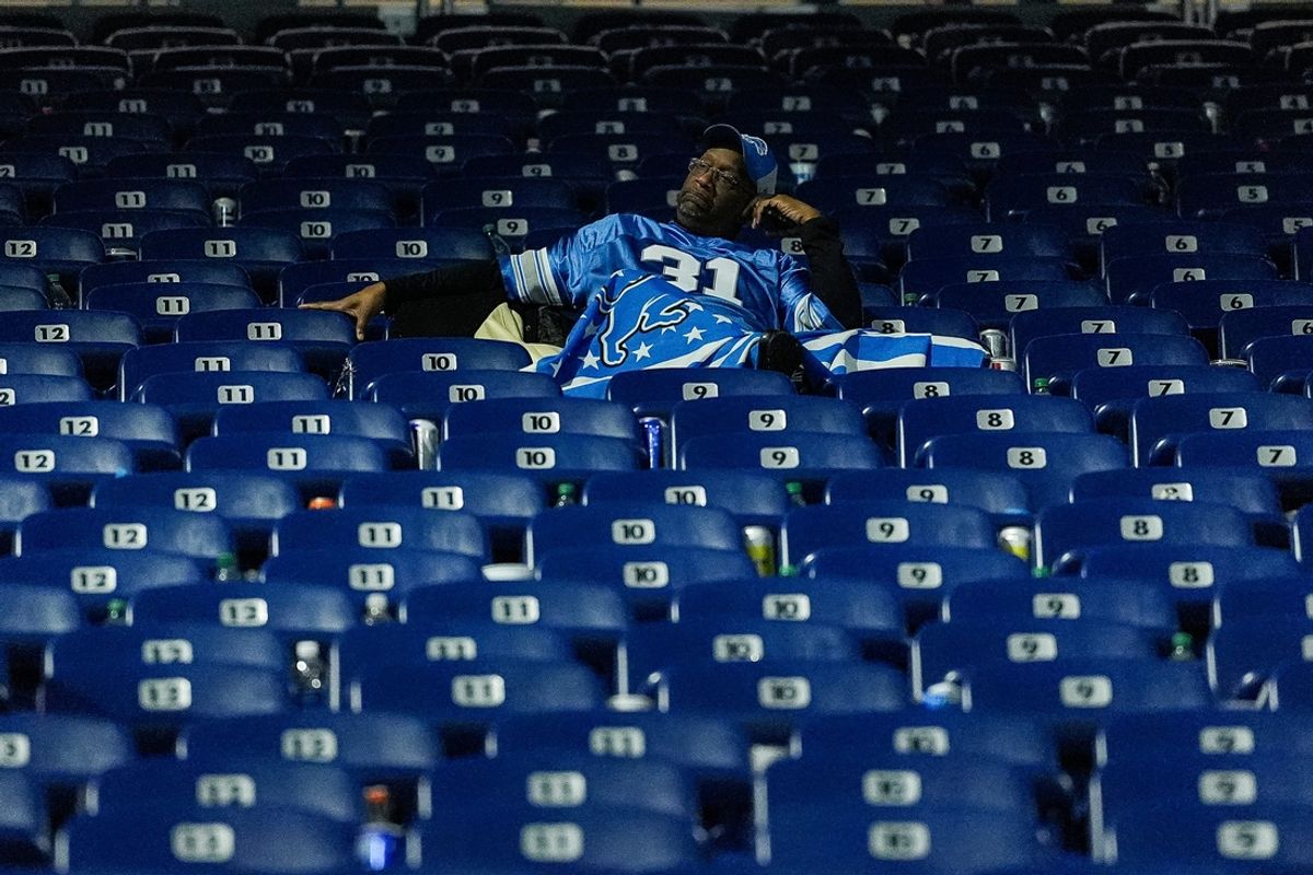 A lone Detroit Lions fan reacts to the stunning 45-31 loss to the Washington Commanders in the NFC divisional round NFL playoff game at Ford Field in Detroit on Saturday, Jan. 18, 2025.