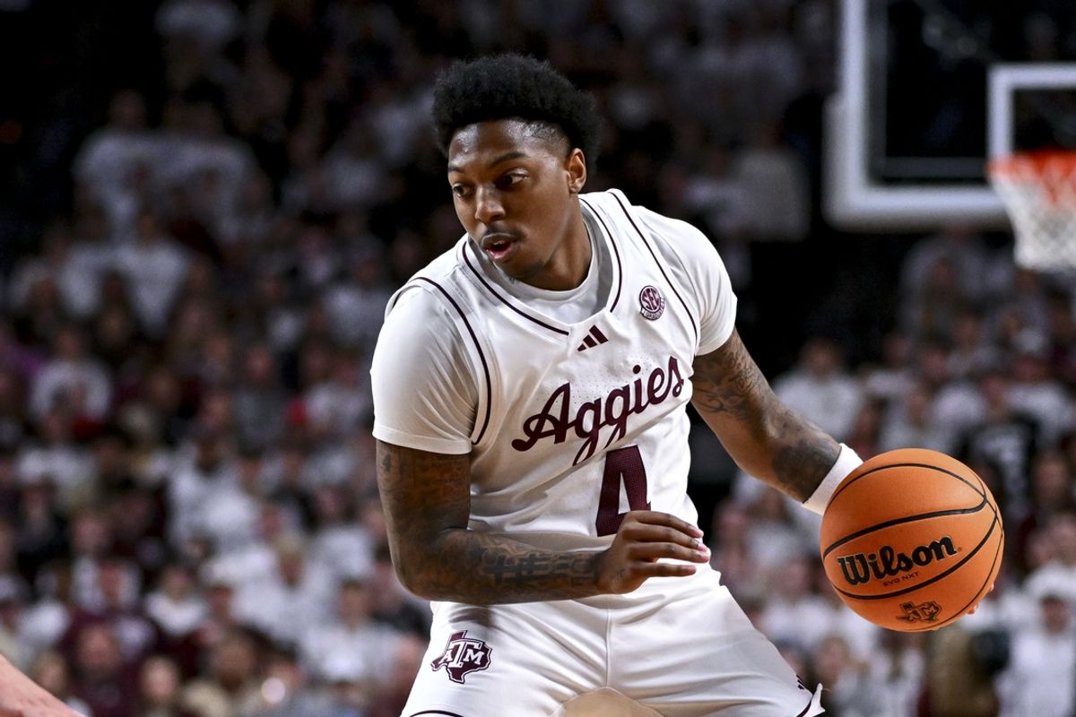 Jan 18, 2025; College Station, Texas, USA; Texas A&M Aggies guard Wade Taylor IV (4) dribbles the ball during the first half against the LSU Tigers at Reed Arena. The Aggies defeated the Tigers 68-57. Mandatory Credit: Maria Lysaker-Imagn Images