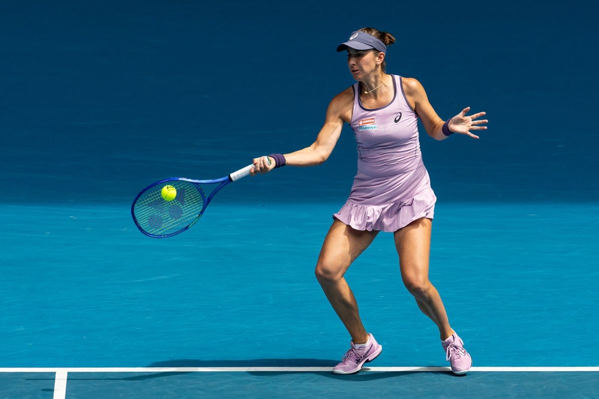 Jan 19, 2025; Melbourne, Victoria, Australia; Belinda Bencic of Switzerland hits a forehand during her match against Coco Gauff of United States of America in the fourth round of the women's singles at the 2025 Australian Open at Melbourne Park. Mandatory Credit: Mike Frey-Imagn Images
