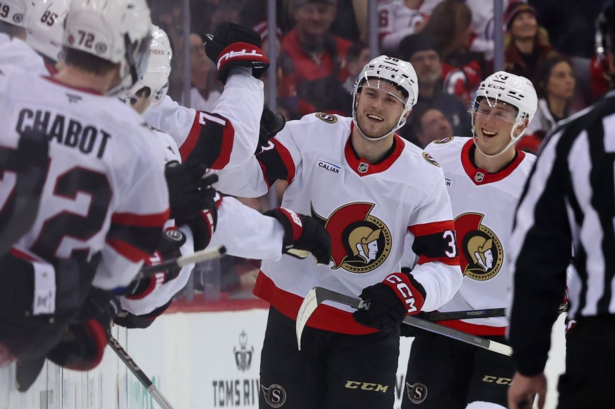 Jan 19, 2025; Newark, New Jersey, USA; Ottawa Senators center Zack Ostapchuk (38) celebrates his goal against the New Jersey Devils during the second period at Prudential Center. Mandatory Credit: Ed Mulholland-Imagn Images