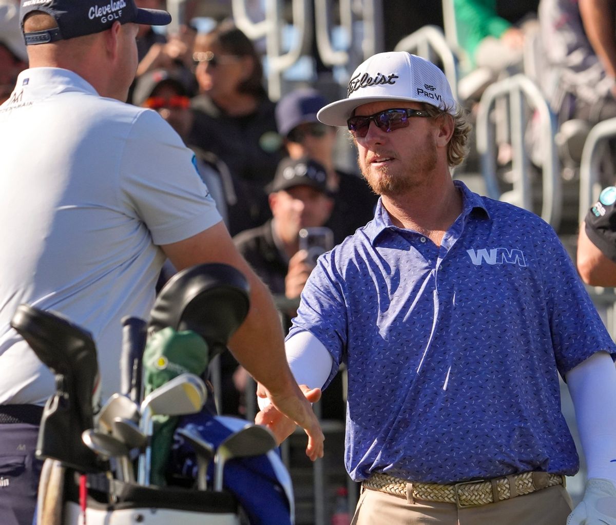 Charley Hoffman shakes hands with Sepp Straka before their tee time on the first hole of the Pete Dye Stadium Course during the final round of The American Express at PGA West in La Quinta, Calif., Sunday, Jan. 19, 2025.