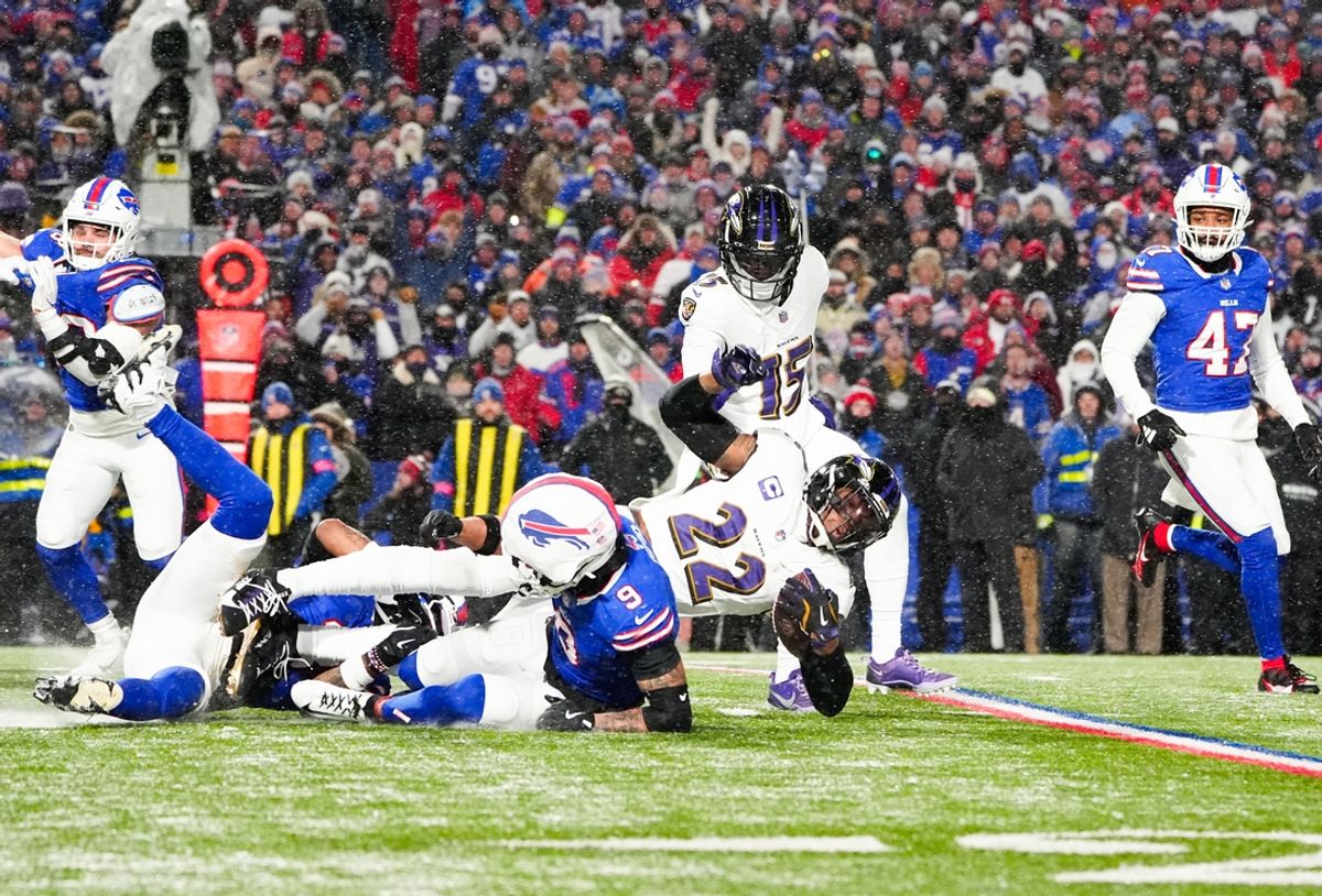 Jan 19, 2025; Orchard Park, New York, USA; Baltimore Ravens running back Derrick Henry (22) is tackled by Buffalo Bills safety Taylor Rapp (9) during the first quarter in a 2025 AFC divisional round game at Highmark Stadium. Mandatory Credit: Gregory Fisher-Imagn Images