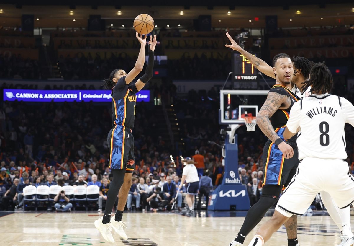 Jan 19, 2025; Oklahoma City, Oklahoma, USA; Oklahoma City Thunder guard Isaiah Joe (11) shoots a three point basket against the Brooklyn Nets during the second half at Paycom Center. Mandatory Credit: Alonzo Adams-Imagn Images
