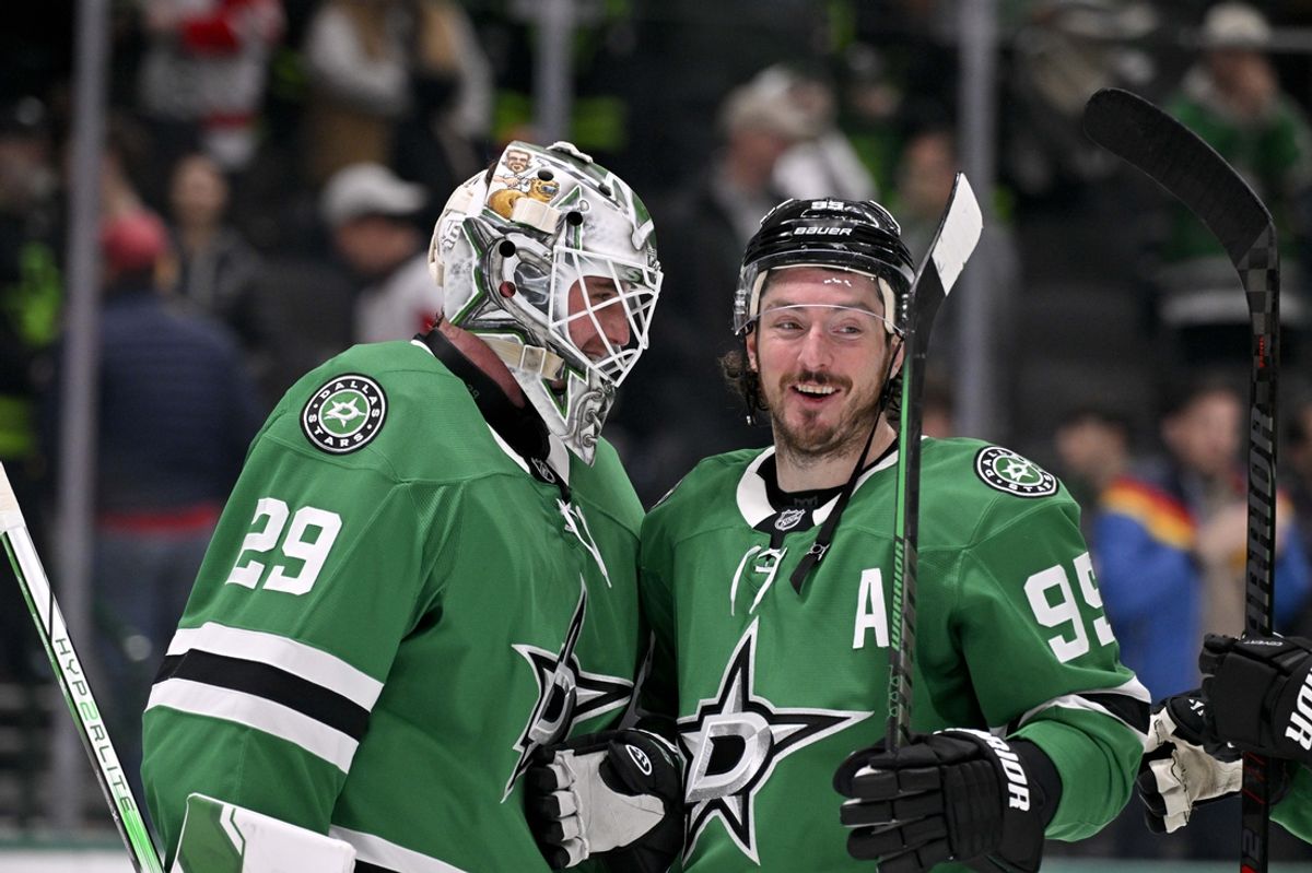 Jan 19, 2025; Dallas, Texas, USA; Dallas Stars goaltender Jake Oettinger (29) and center Matt Duchene (95) celebrate with win over the Detroit Red Wings at the American Airlines Center. Mandatory Credit: Jerome Miron-Imagn Images