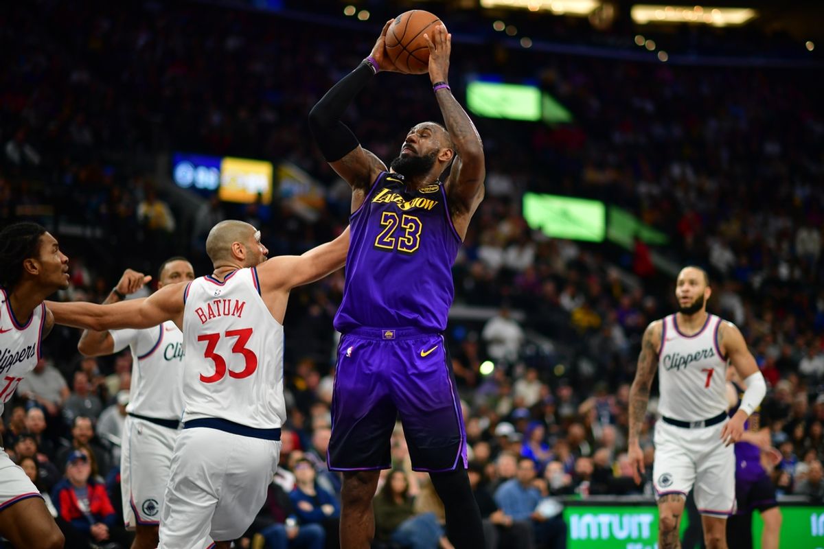 Jan 19, 2025; Inglewood, California, USA; Los Angeles Lakers forward LeBron James (23) moves to the basket against Los Angeles Clippers forward Nicolas Batum (33) during the second half at Intuit Dome. Mandatory Credit: Gary A. Vasquez-Imagn Images