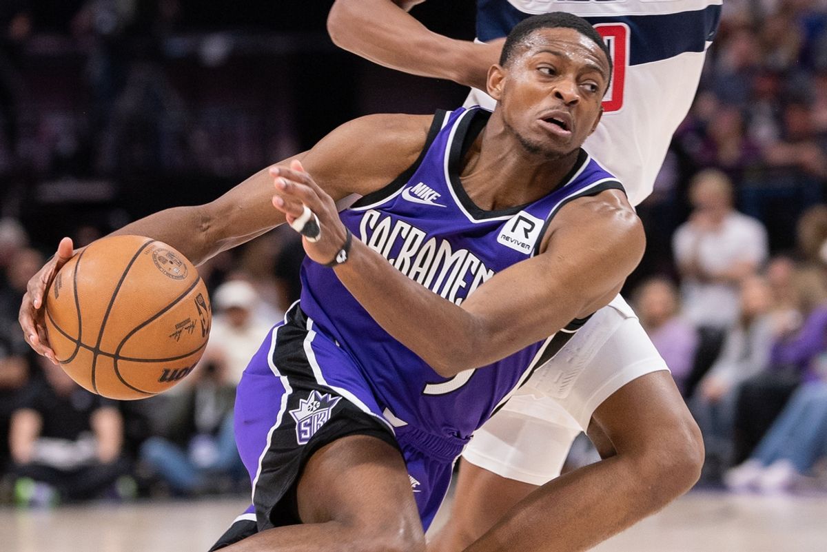 Jan 19, 2025; Sacramento, California, USA; Sacramento Kings guard De'Aaron Fox (5) drives to the basket against the Washington Wizards during the fourth quarter at Golden 1 Center. Mandatory Credit: Ed Szczepanski-Imagn Images
