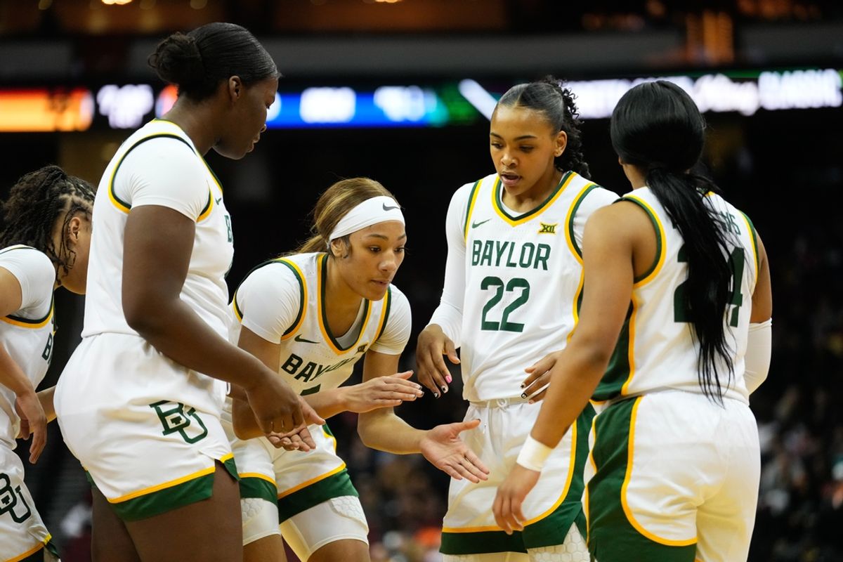 Jan 20, 2025; Newark, New Jersey, USA; Baylor Lady Bears guard Darianna Littlepage-Buggs (5) leads a huddle during a break in play against the UCLA Bruins during the first half at Prudential Center. Mandatory Credit: Chris Jones-Imagn Images