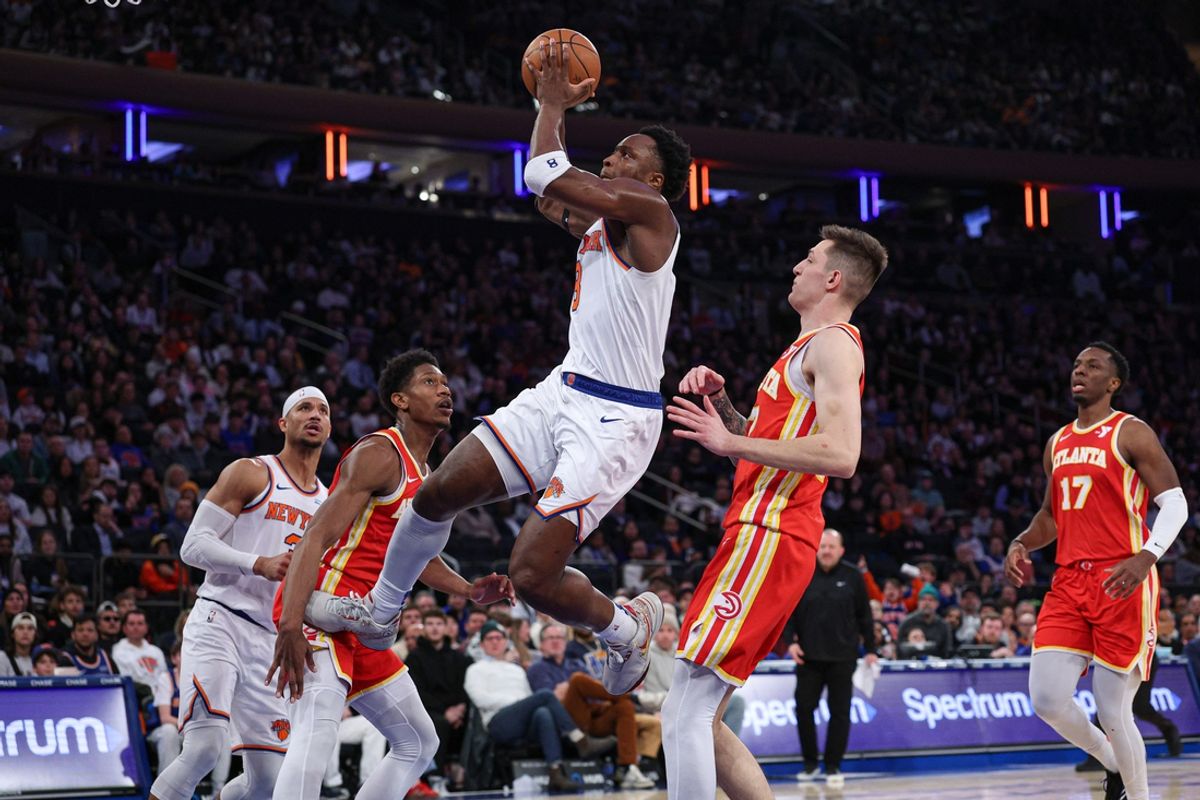 Jan 20, 2025; New York, New York, USA; New York Knicks forward OG Anunoby (8) goes to the basket in front of Atlanta Hawks guard Vit Krejci (27) during the first half at Madison Square Garden. Mandatory Credit: Vincent Carchietta-Imagn Images