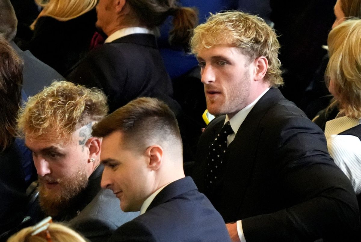 Boxer Jake Paul and wrestler Logan Paul sit in the viewing area in the Emancipation Hall on the Inauguration Day of Donald Trump's second presidential term in Washington, U.S. January 20, 2025.