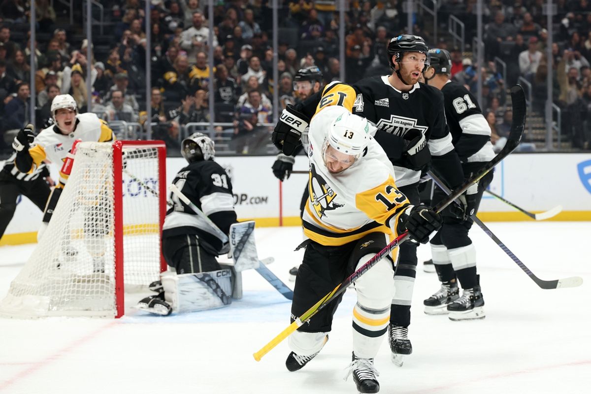 Jan 20, 2025; Los Angeles, California, USA;  Pittsburgh Penguins right wing Kevin Hayes (13) celebrates after scoring a goal against Los Angeles Kings goaltender David Rittich (31) during the first period at Crypto.com Arena. Mandatory Credit: Kiyoshi Mio-Imagn Images