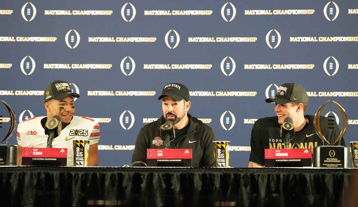 Jan 20, 2025; Atlanta, GA, USA; Ohio State Buckeyes head coach Ryan Day is interviewed with Cody Simon and Will Howard after defeating the Notre Dame Fighting Irish in the CFP National Championship college football game at Mercedes-Benz Stadium. Mandatory Credit: Kirby Lee-Imagn Images