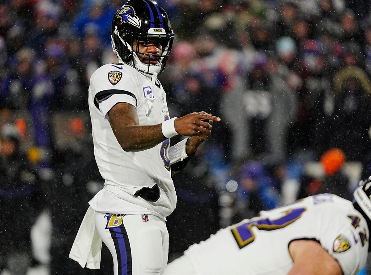 Baltimore Ravens quarterback Lamar Jackson directs his teammates before the snap during first half action at the Buffalo Bills divisional game against the Baltimore Ravens at Highmark Stadium in Orchard Park on Jan. 19, 2025.