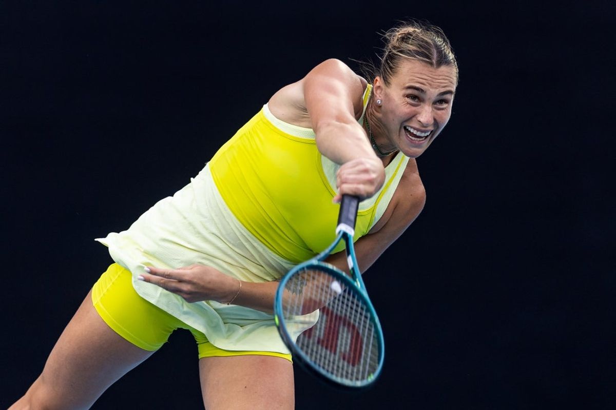 Jan 21, 2025; Melbourne, Victoria, Australia; Aryna Sabalenka serves during her match against Anastasia Pavlyuchenkova in the quarterfinals of the women's singles at the 2025 Australian Open at Melbourne Park. Mandatory Credit: Mike Frey-Imagn Images