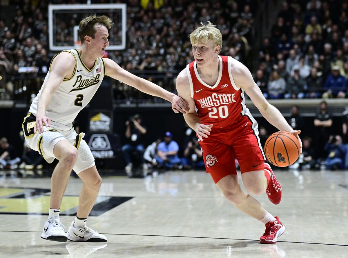 Jan 21, 2025; West Lafayette, Indiana, USA; Ohio State Buckeyes forward Colin White (20) drives the ball past Purdue Boilermakers guard Fletcher Loyer (2) during the first half at Mackey Arena. Mandatory Credit: Marc Lebryk-Imagn Images