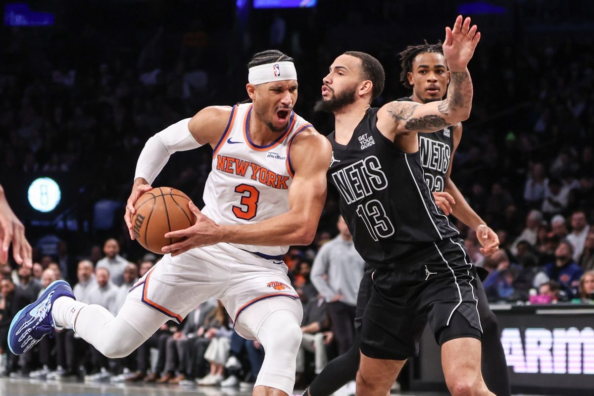 Jan 21, 2025; Brooklyn, New York, USA;  New York Knicks guard Josh Hart (3) looks to drive past Brooklyn Nets guard Tyrese Martin (13) in the second quarter at Barclays Center. Mandatory Credit: Wendell Cruz-Imagn Images