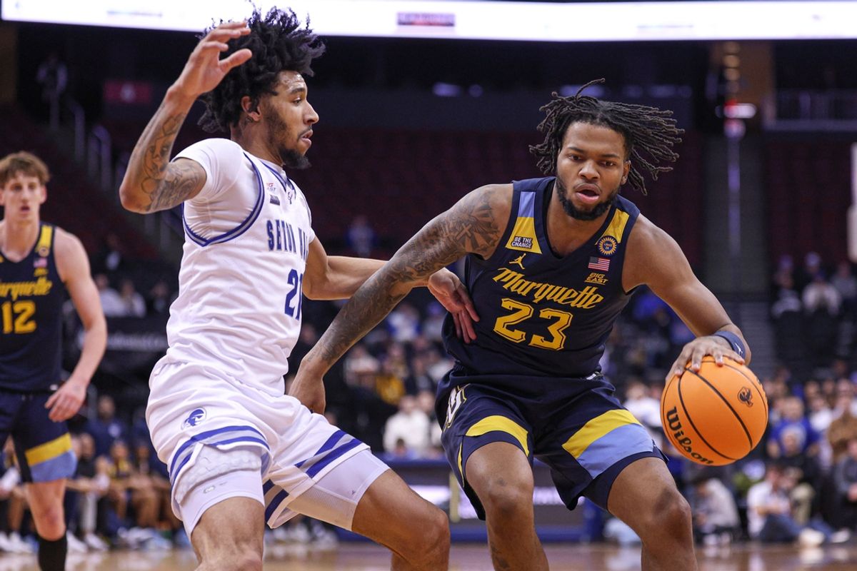 Jan 21, 2025; Newark, New Jersey, USA; Marquette Golden Eagles forward David Joplin (23) is guarded by Seton Hall Pirates guard Isaiah Coleman (21) during the first half at Prudential Center. Mandatory Credit: Vincent Carchietta-Imagn Images