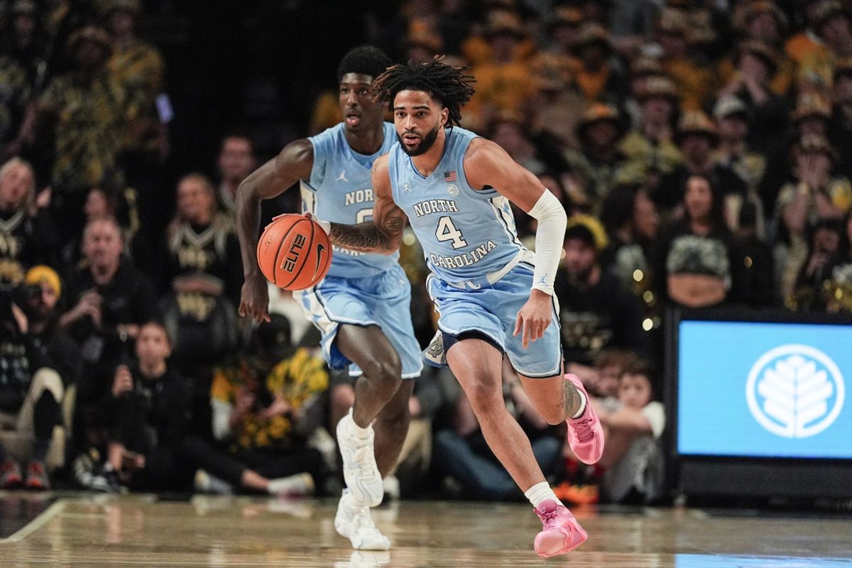 Jan 21, 2025; Winston-Salem, North Carolina, USA; North Carolina Tar Heels guard RJ Davis (4) brings the ball up court against the Wake Forest Demon Deacons during the first half  at Lawrence Joel Veterans Memorial Coliseum. Mandatory Credit: Jim Dedmon-Imagn Images