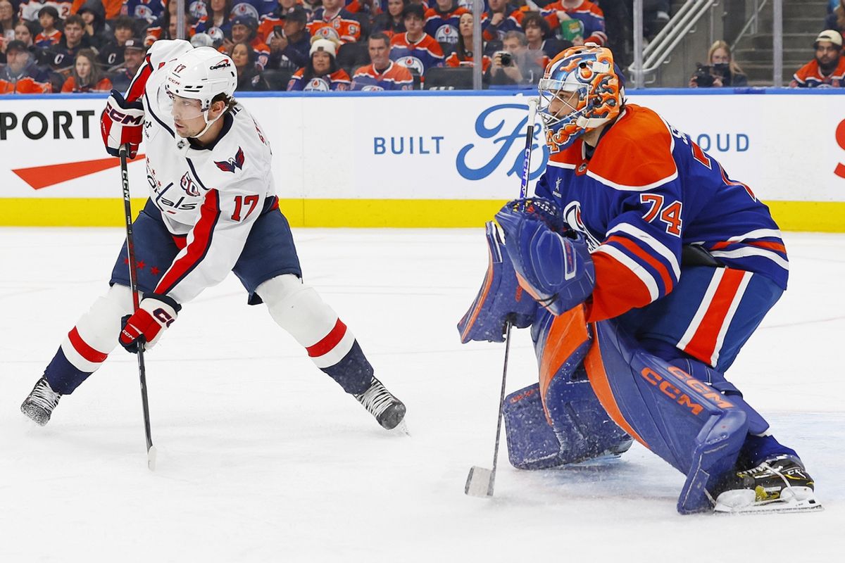 Jan 21, 2025; Edmonton, Alberta, CAN; Washington Capitals forward Dylan Strome (17) looks for a pass in front of Edmonton Oilers goaltender Stuart Skinner (74) during the second period at Rogers Place. Mandatory Credit: Perry Nelson-Imagn Images