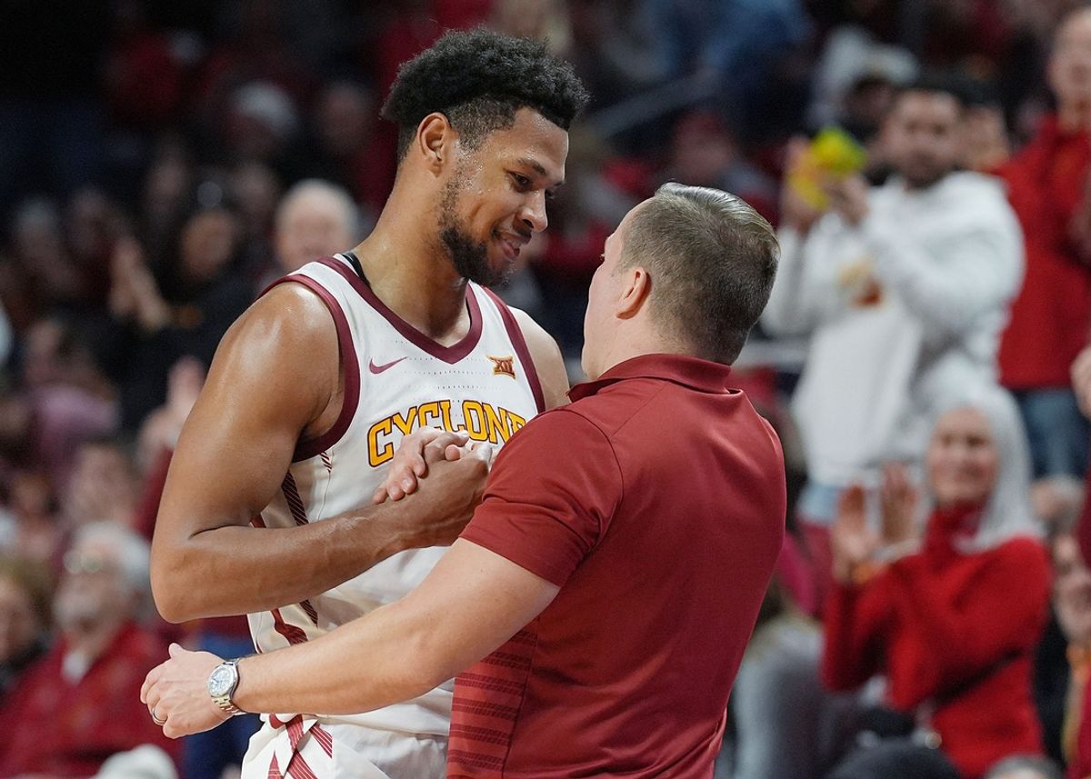 Iowa State Cyclones men's basketball head coach T.J. Otzelberger congratulates Iowa State Cyclones forward Joshua Jefferson (2) during the second half against UCF in the Big-12 men’s basketball at Hilton Coliseum onTuesday, Jan. 21, 2025 in Ames, Iowa.