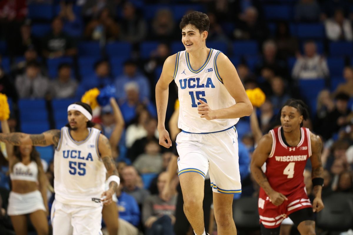 Jan 21, 2025; Los Angeles, California, USA;  UCLA Bruins center Aday Mara (15) reacts after scoring a basket during the second half against the Wisconsin Badgers at Pauley Pavilion presented by Wescom. Mandatory Credit: Kiyoshi Mio-Imagn Images
