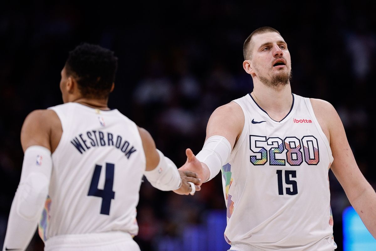 Jan 21, 2025; Denver, Colorado, USA; Denver Nuggets center Nikola Jokic (15) and guard Russell Westbrook (4) in the third quarter against the Philadelphia 76ers at Ball Arena. Mandatory Credit: Isaiah J. Downing-Imagn Images