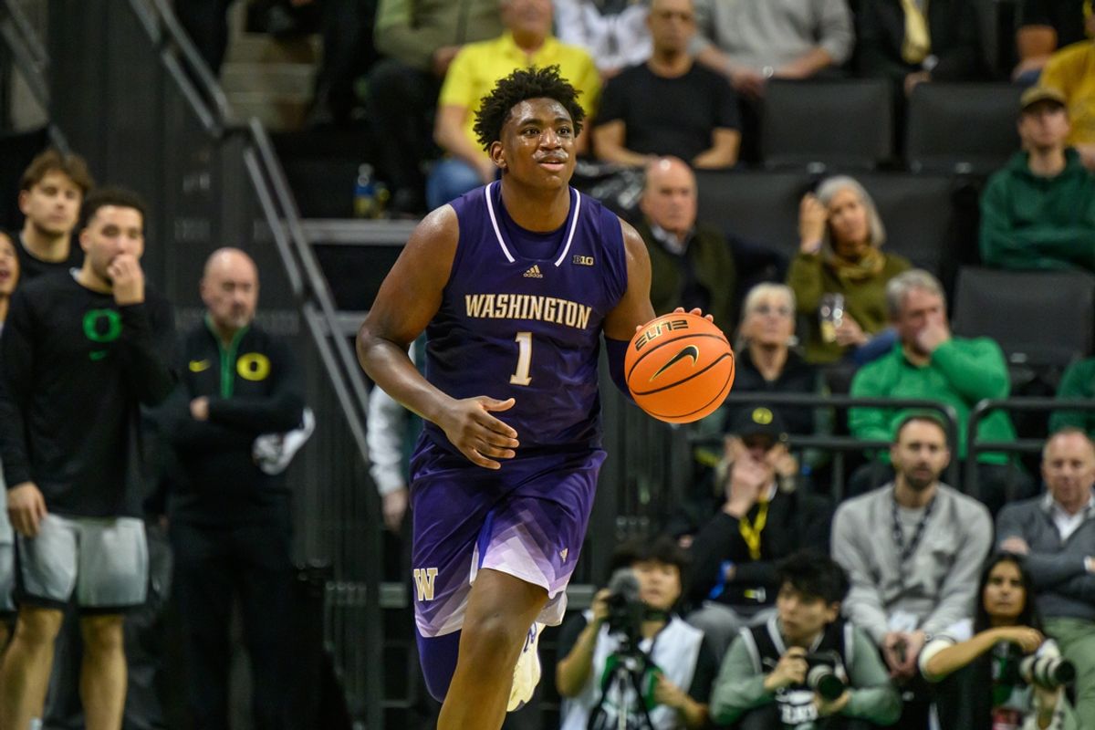 Jan 21, 2025; Eugene, Oregon, USA; Washington Huskies forward Great Osobor (1) dribbles against the Oregon Ducks during the second half at Matthew Knight Arena. Mandatory Credit: Craig Strobeck-Imagn Images