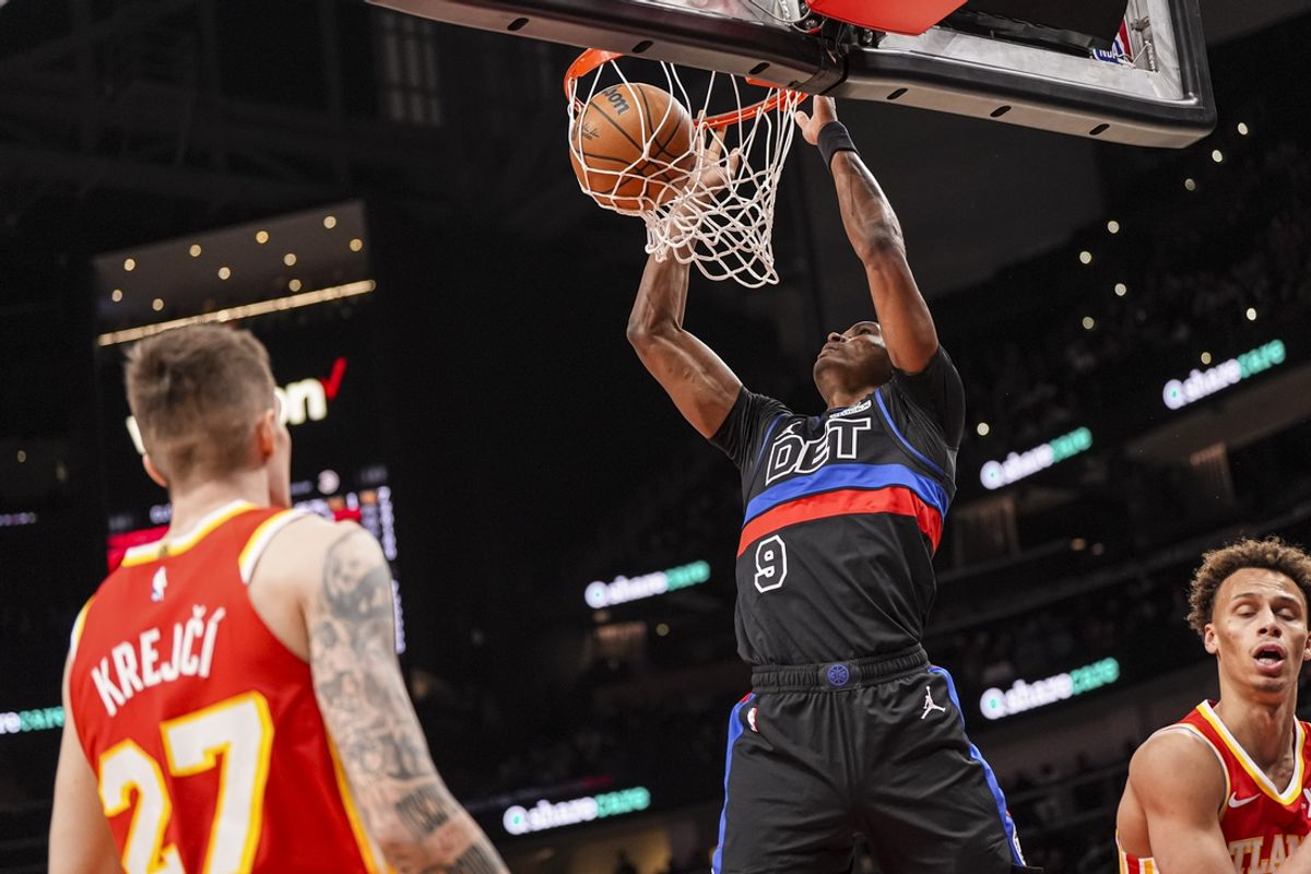Jan 22, 2025; Atlanta, Georgia, USA; Detroit Pistons forward Ausar Thompson (9) dunks against the Atlanta Hawks during the first half at State Farm Arena. Mandatory Credit: Dale Zanine-Imagn Images