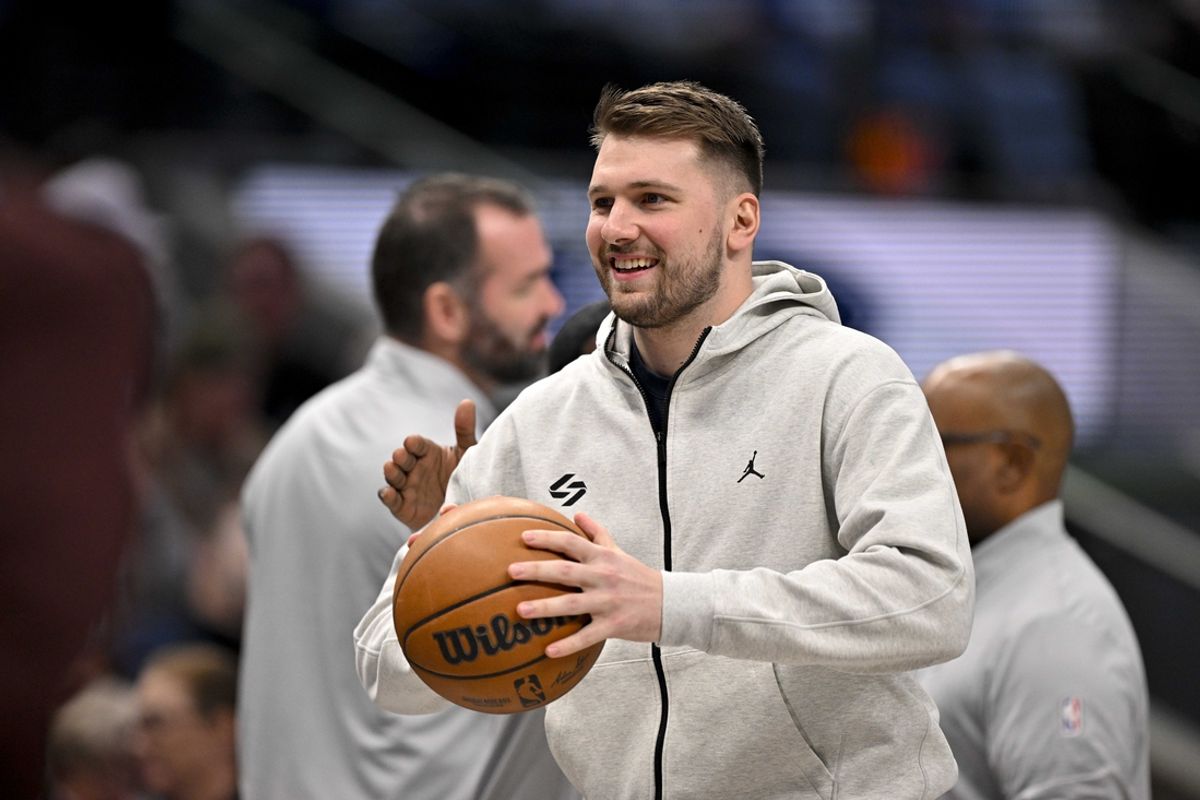 Jan 22, 2025; Dallas, Texas, USA; Dallas Mavericks guard Luka Doncic (77) looks on during a stoppage in play during the first half of the game between the Dallas Mavericks and the Minnesota Timberwolves at the American Airlines Center. Mandatory Credit: Jerome Miron-Imagn Images