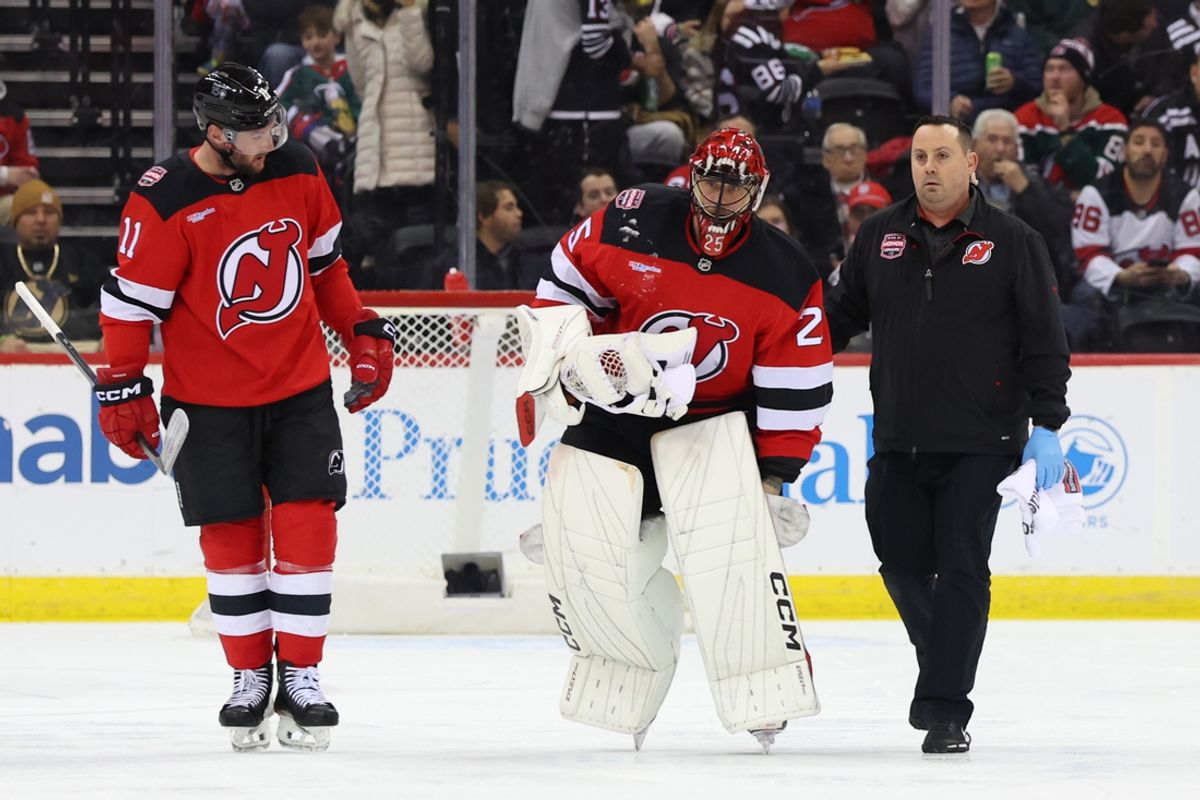 Jan 22, 2025; Newark, New Jersey, USA; New Jersey Devils goaltender Jacob Markstrom (25) is injured during the second period of their game against the Boston Bruins at Prudential Center. Mandatory Credit: Ed Mulholland-Imagn Images