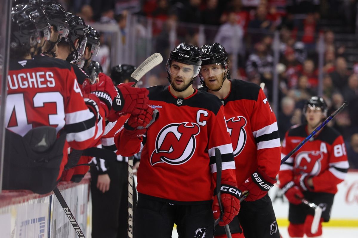 Jan 22, 2025; Newark, New Jersey, USA; New Jersey Devils center Nico Hischier (13) celebrates his goal against the Boston Bruins during the third period at Prudential Center. Mandatory Credit: Ed Mulholland-Imagn Images