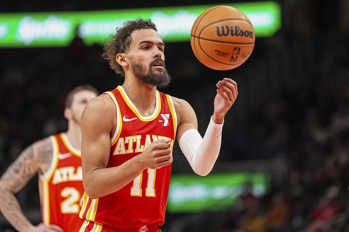 Jan 22, 2025; Atlanta, Georgia, USA; Atlanta Hawks guard Trae Young (11) prepares to shoot from the free throw line against the Detroit Pistons during the second half at State Farm Arena. Mandatory Credit: Dale Zanine-Imagn Images