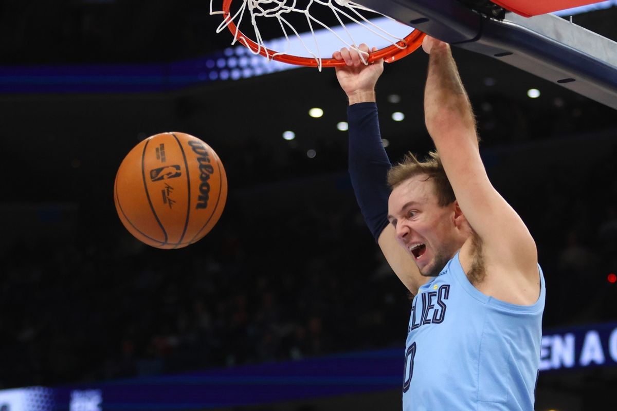 Jan 22, 2025; Memphis, Tennessee, USA; Memphis Grizzlies guard Luke Kennard (10) dunks during the fourth quarter against the Charlotte Hornets at FedExForum. Mandatory Credit: Petre Thomas-Imagn Images
